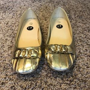 Gold flat shoes